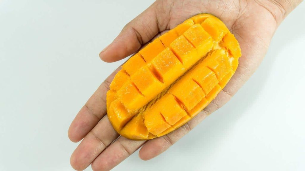 mango on a hand